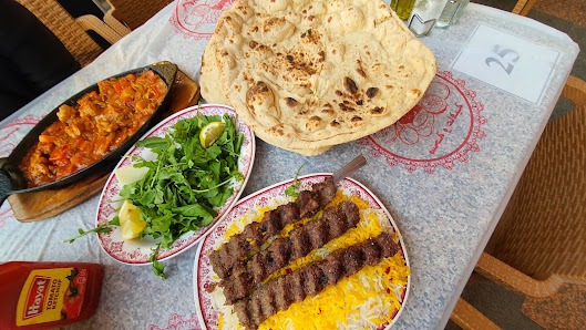 Kabab meal with saffron rice, tandoor bread and chicken masala