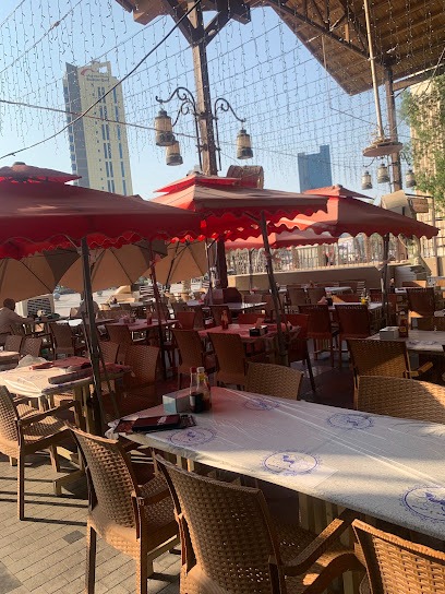 Outdoor terrace seating with skyline view